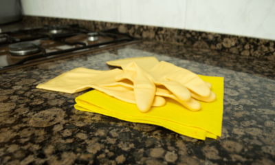 glove and cloth on the kitchen granite