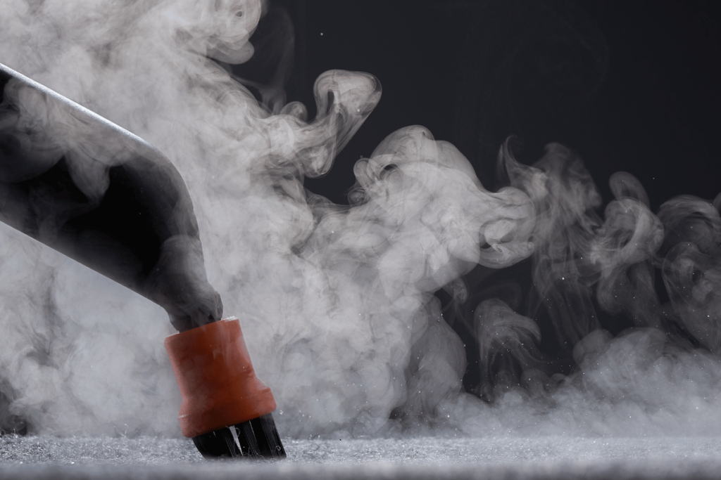 Close-Up Horizontal Shot of Steam Cleaning a Carpet